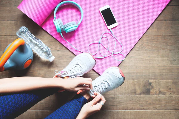 Sport and healthy woman tying her shoes, Workout at home, Wellbeing — Stock Photo, Image