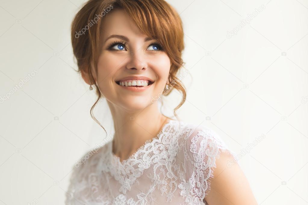 Beautiful young bride with wedding makeup