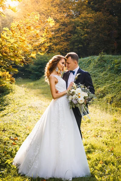 Elegant curly bride and stylish groom — Stock Photo, Image