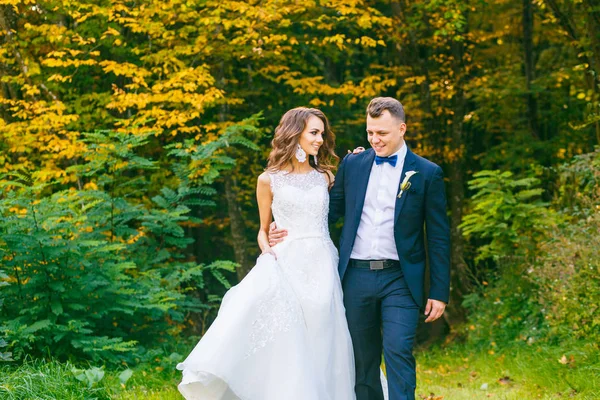 Elegant curly bride and stylish groom — Stock Photo, Image