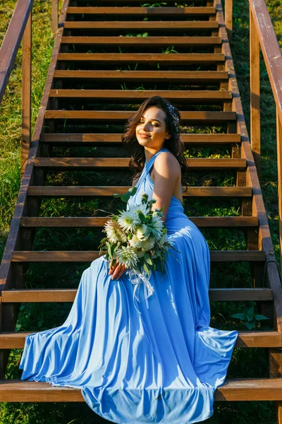 Beautiful young bridesmaid with curly hair — Stock Photo, Image