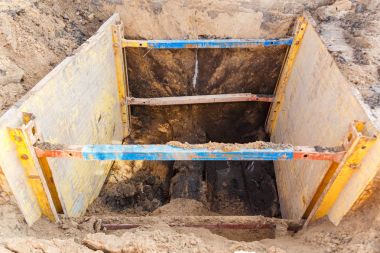 Trench to repair the pipe break. clipart