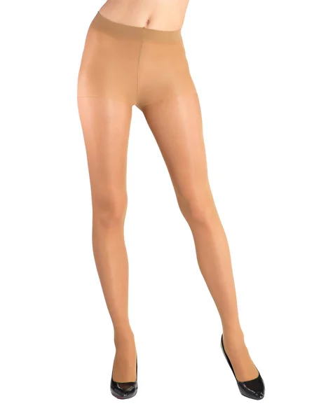 Wohlgeformte weibliche Beine in Strumpfhosen Körperfarbe — Stockfoto