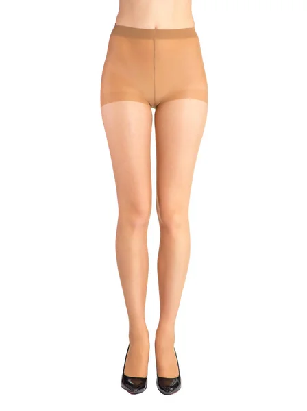 Shapely female legs dressed in tights body color — Stock Photo, Image