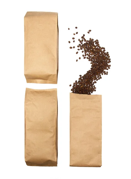 Coffee beans spill out of the package — Stock Photo, Image