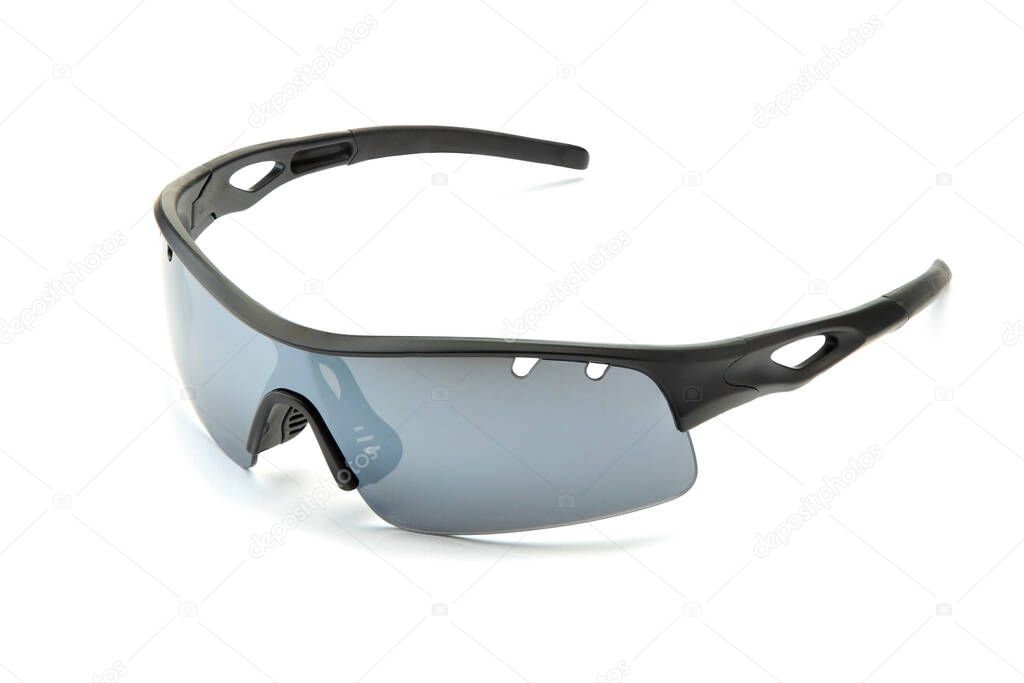 Modern stylish black sports bike sun glasses with smoky grey lenses isolated on white background