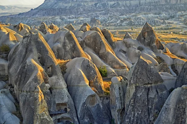 Rocks looking like mushrooms dramatically lit by a sunrise  in Cappadocia — Stock Photo, Image