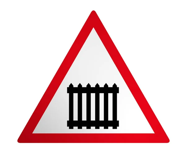 German traffic sign: railway crossing with barriers — стокове фото