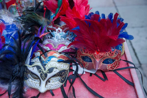 group of colorful carnival masks, isolated on sale counter