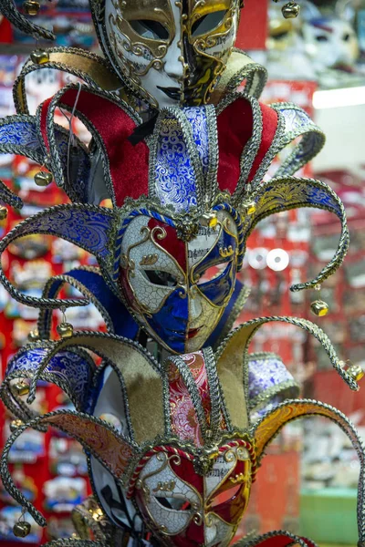 Set of carnival joker masks in various colors. Cheerfulness concept. Product for sale in Venice, Italy.