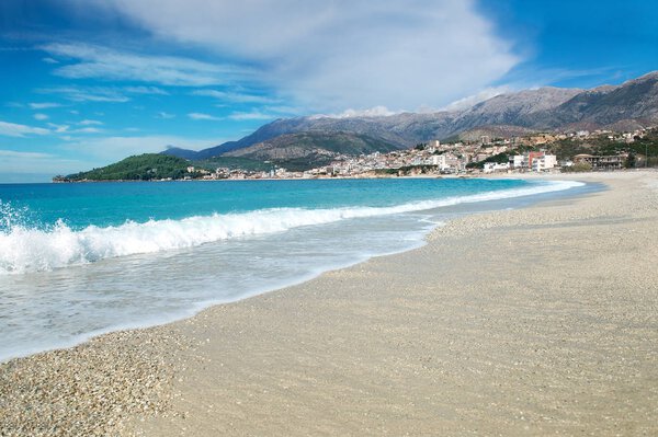 Scenic seascape of Albanian Riviera in Himara town in the south, clear turquoise water of Ionian Sea