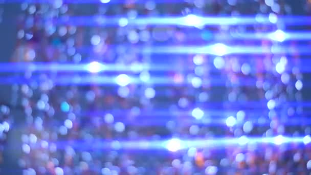 Moving blue glitter lights, defocused light reflections — Stock Video