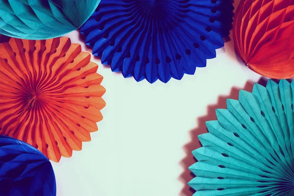 Paper fans and honeycombs on the orange background — 스톡 사진