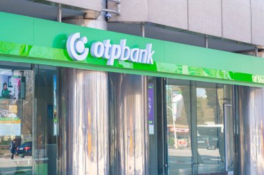 OTP Bank logo on its central administration building in Tirana, Albania clipart
