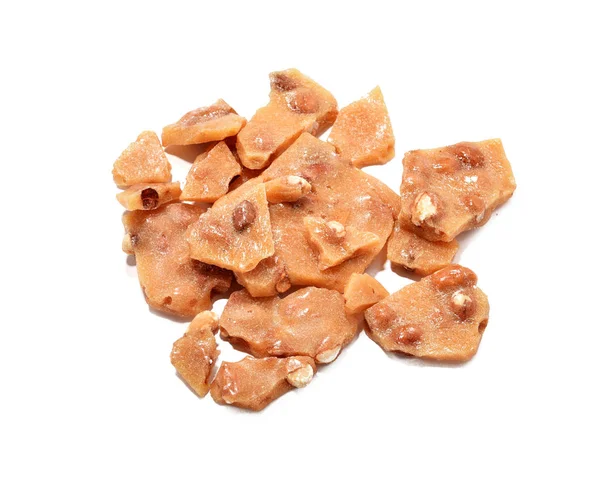 Peanut brittle candy on white background — Stock Photo, Image