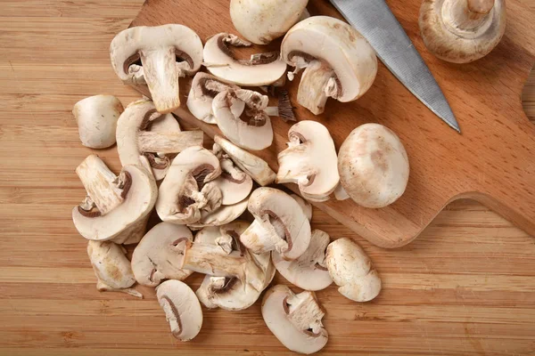 Sliced mushrooms overhead view — Stock Photo, Image