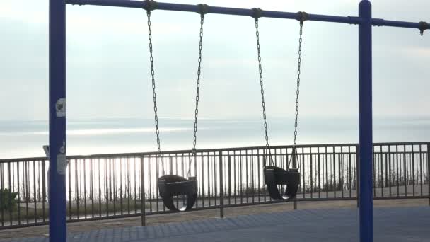 Swing Set Playground Pacific Ocean — Stock video