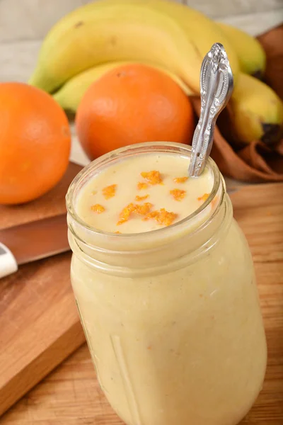 Homemade orange banana smoothie — Stock Photo, Image