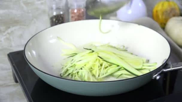Placing Julienned Zucchini Skillet Saute — Stock Video