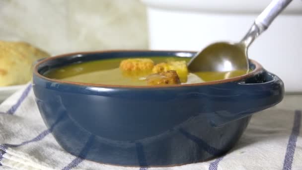 Taking a spoonful of sweet potato bisque — Stock Footage Taking Spoonful Sweet Potato Bisque Stock Footage