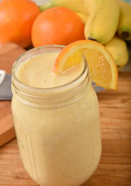 Homemade orange banana smoothie — Stock Photo, Image