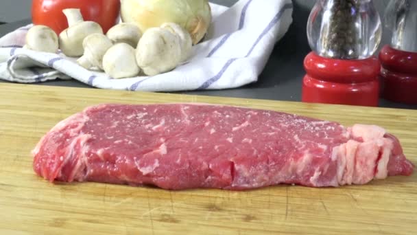 Sprinkling Salt Rib Steak Slow Motion — Stock Video