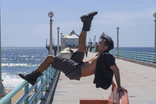 Asian Man Stretching on Pier — Stock Photo, Image