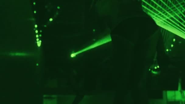 Sexy Male Dancer Silhouetted Strobing Green Disco Lights — Stock Video