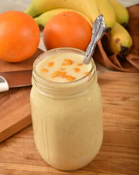 Orange banana smoothie — Stock Photo, Image
