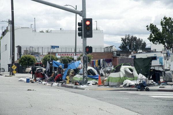 Los Angeles, CA/USA - April 9, 2020: A homeless encampment spreads filth and disease during coronavirus outbreak in downtown LA