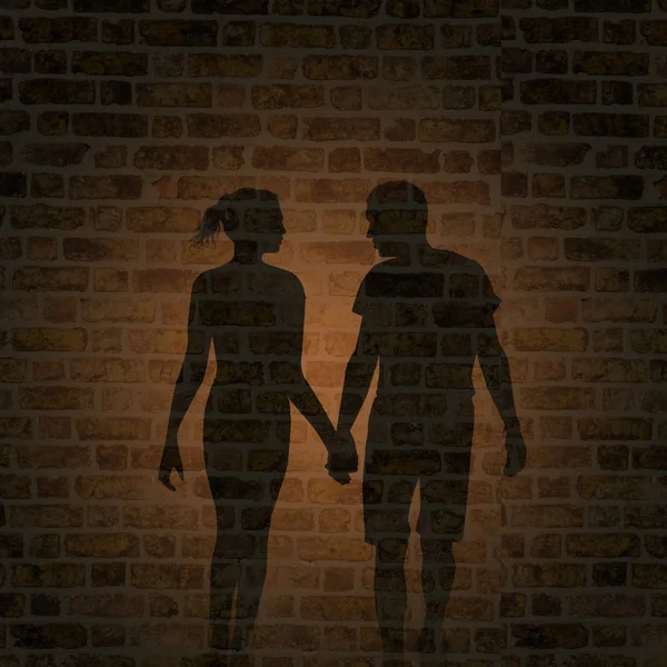 shadow of man and woman on the wall