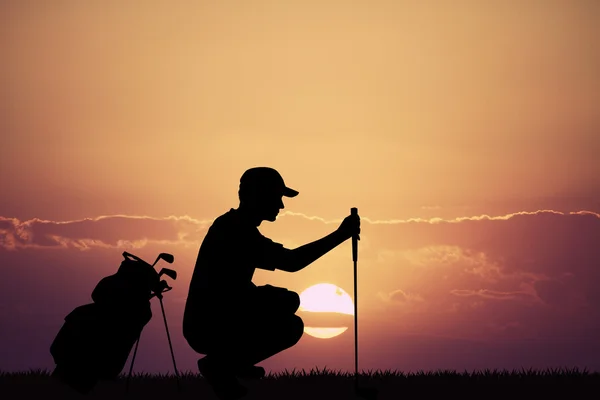 Jogador de golfe ao pôr do sol — Fotografia de Stock