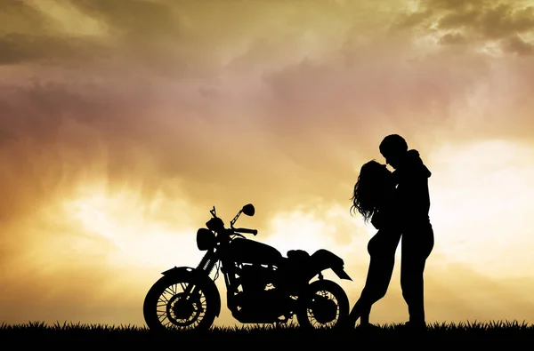 Couple baisers sur moto Image En Vente