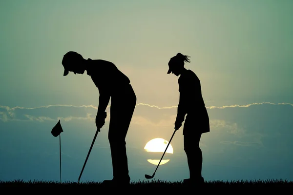 Golfer silhouet bij zonsondergang — Stockfoto