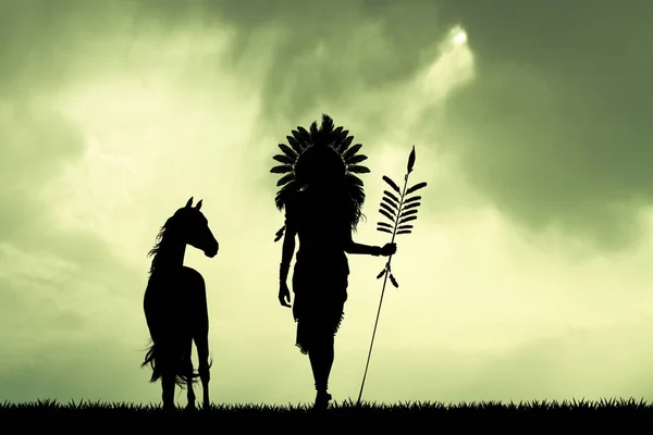 Indian native american na zachodzie słońca — Zdjęcie stockowe