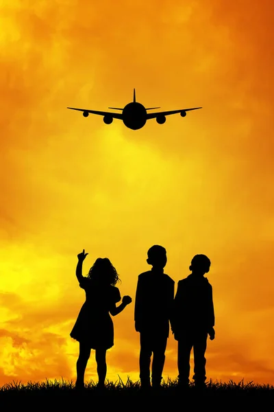 Children looking the airplane — Stock Photo, Image