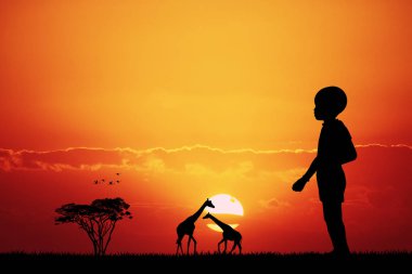 Gün batımında Afrikalı Çocuk