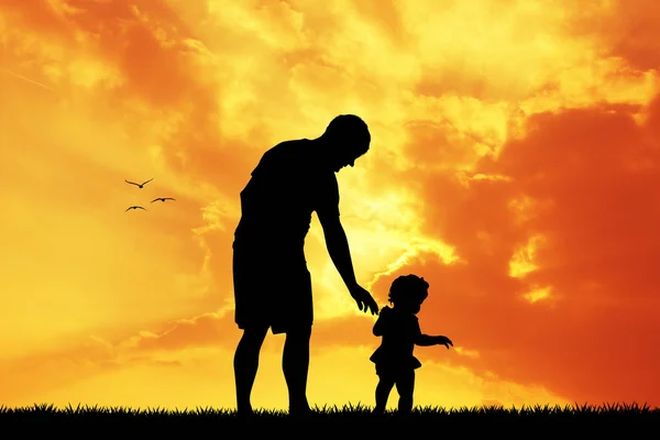 Man with son at sunset — Stock Photo, Image