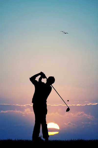 Mannen golfen bij zonsondergang — Stockfoto