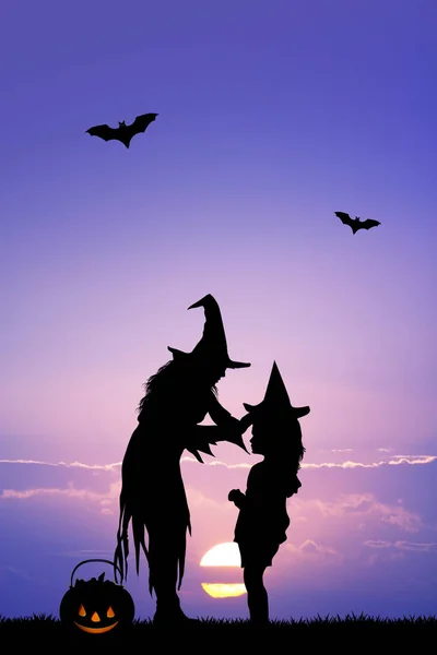 Madre e bambina con costume da strega — Foto Stock