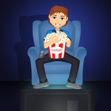 adam tv koltuk üzerinde görünüyor.