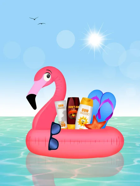 Inflatable pink flamingo with summer objects — Stock Photo, Image
