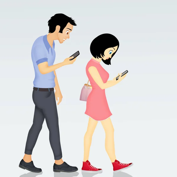 Folk som går med smarttelefoner – stockfoto