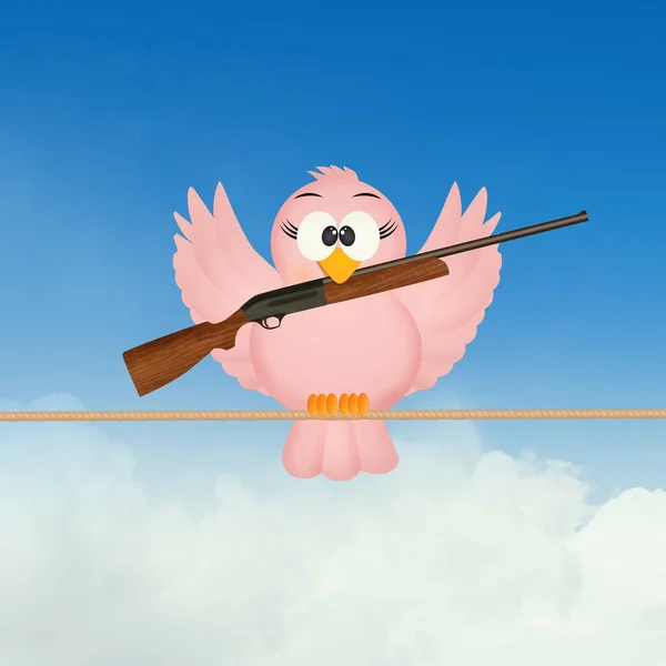 Bird with hunting rifle — Stock Photo, Image