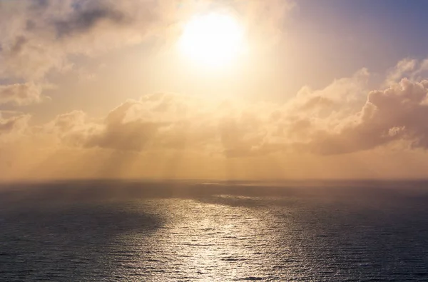 sea landscape with sun rays