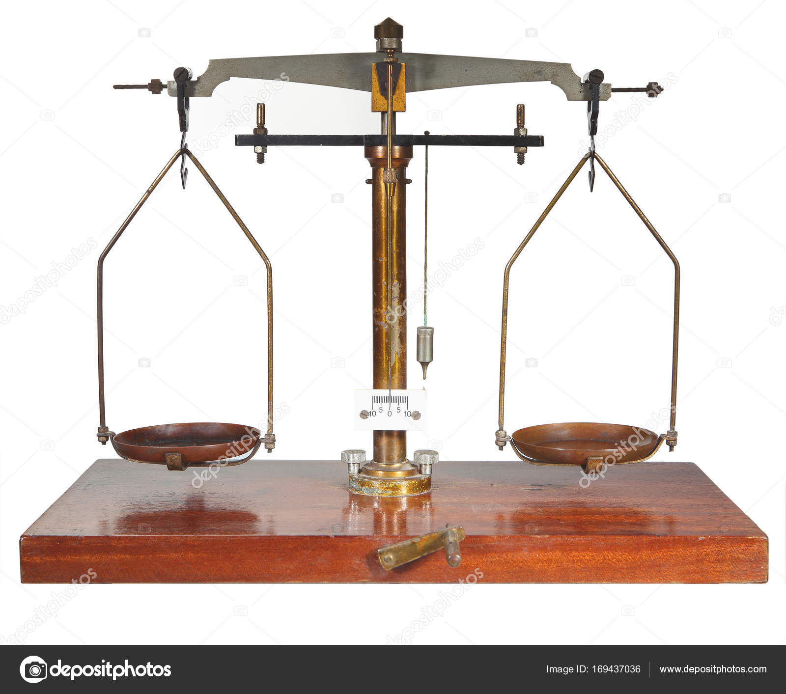 Traditional brass "gold or silver" weighting scales on white background