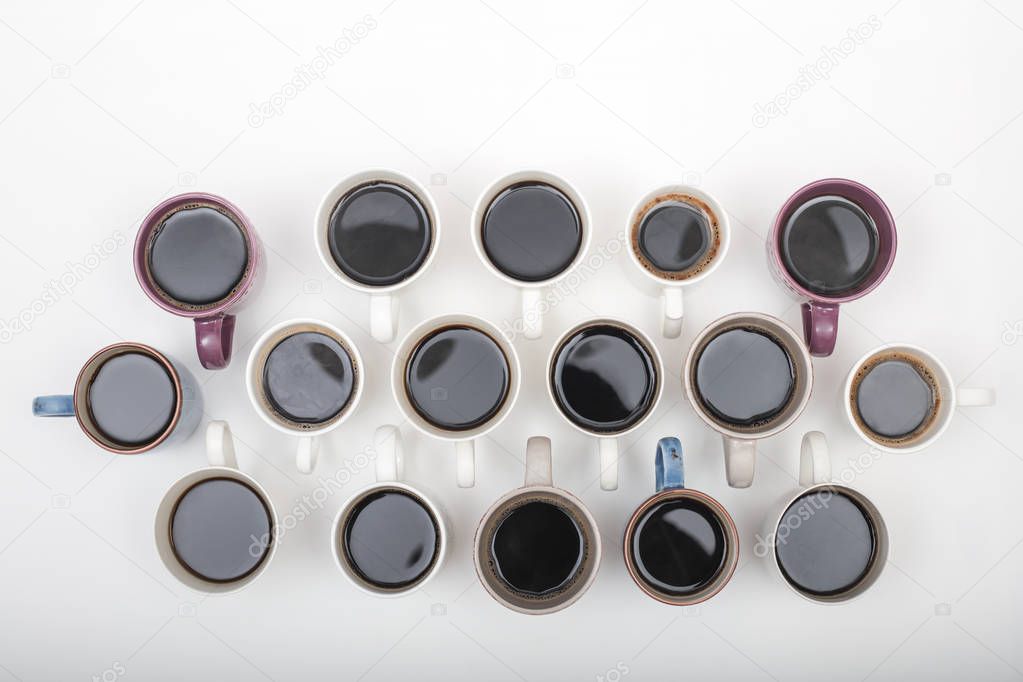 High angle view cups of coffee assortment on white backgroung