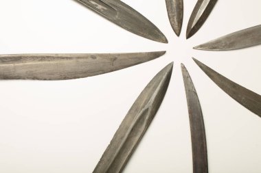 Close up  of old knife blades and swords clipart