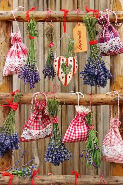 lavender and fragant sacs on wooden ladder clipart