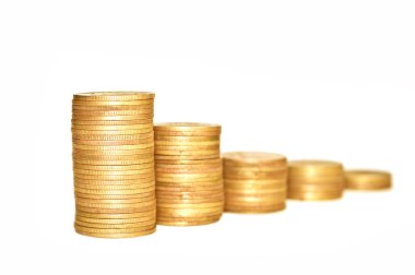 Beyaz zemin üzerine altın sikke. Makro